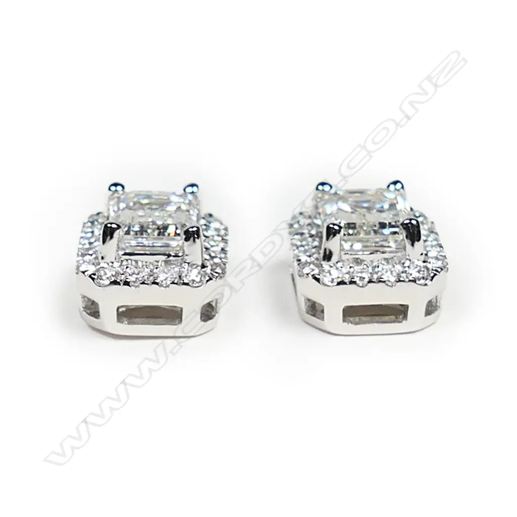 A pair of 18ct white gold and diamond earrings, Image 1++