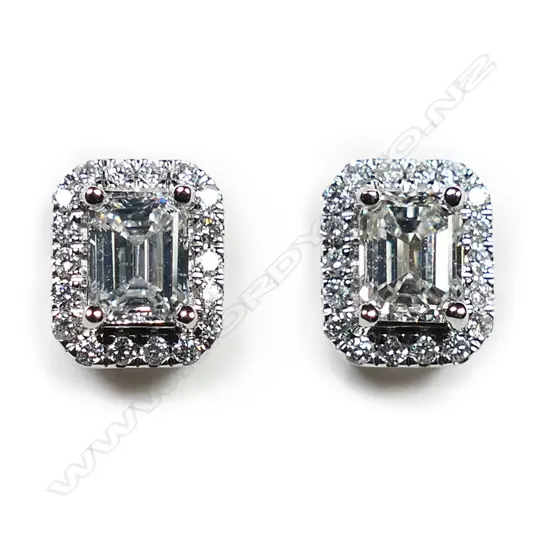 A pair of 18ct white gold and diamond earrings,