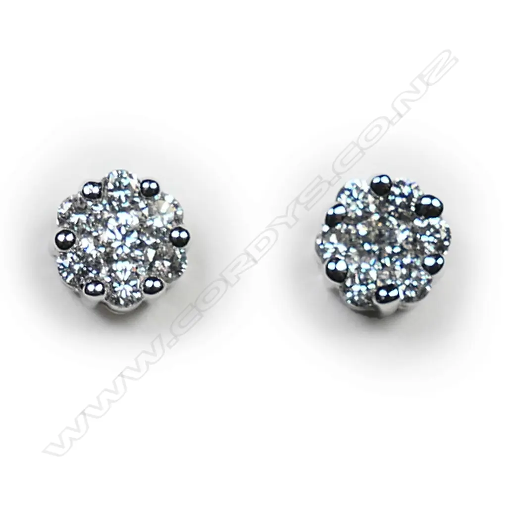 A pair of 18ct white gold and diamond earrings, Image 1++