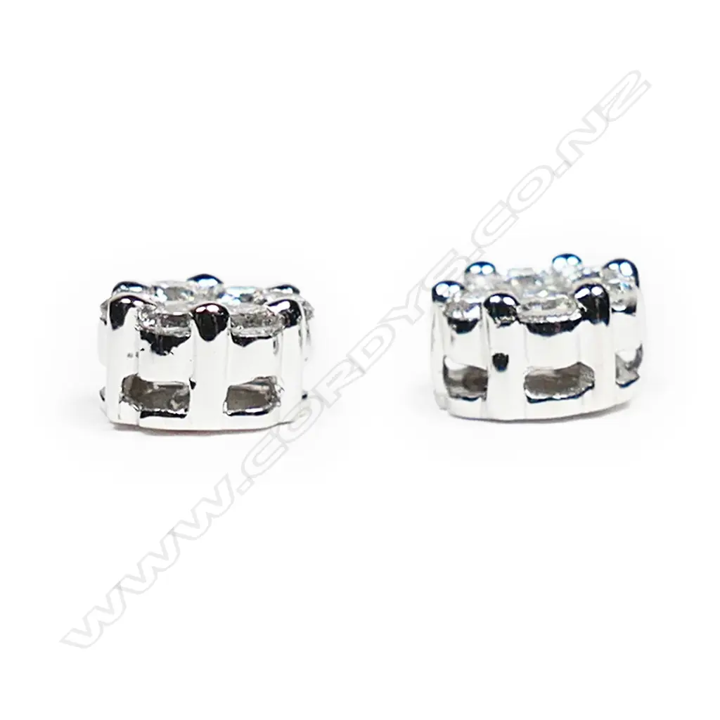 A pair of 18ct white gold and diamond earrings, Image 1++