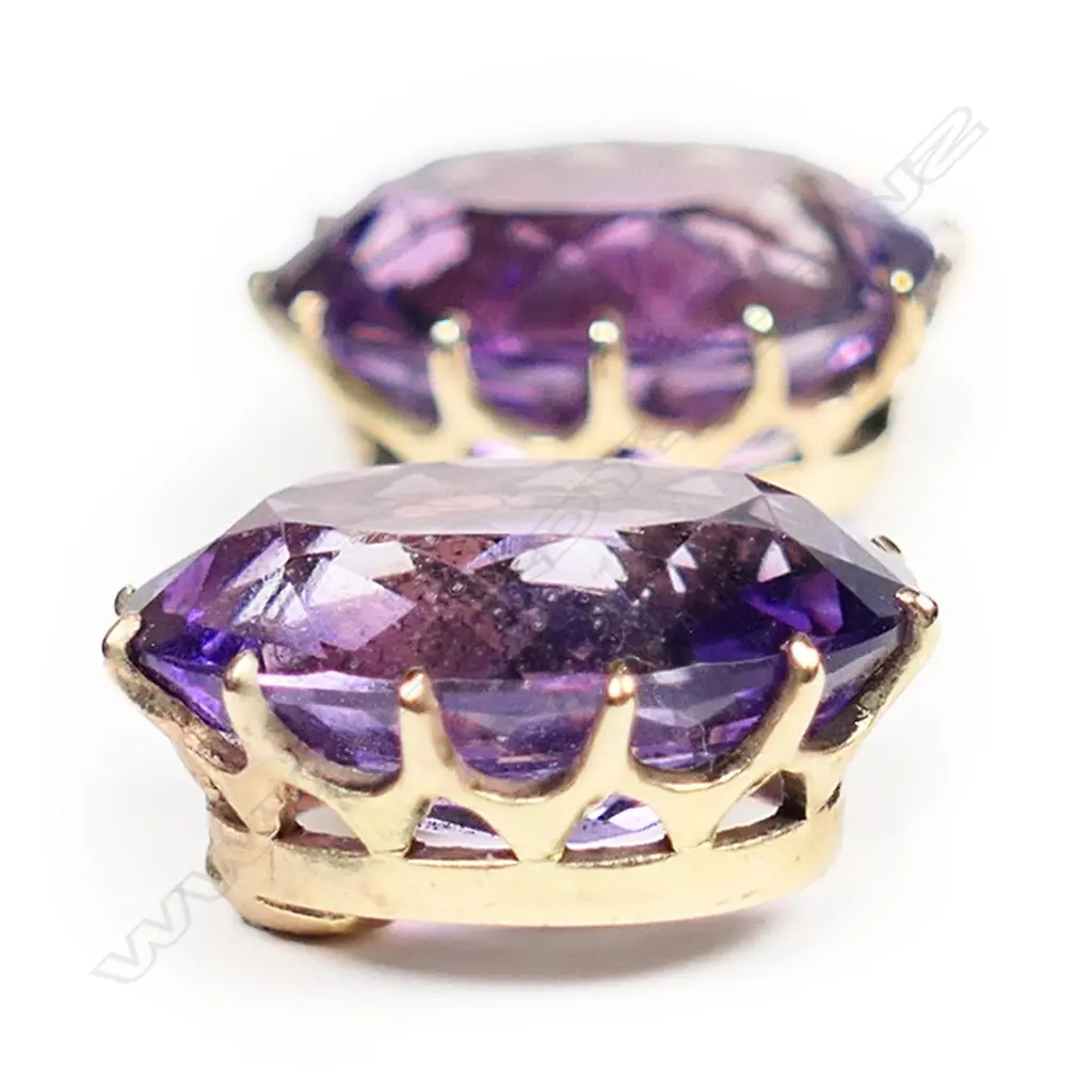 A pair of estate 9ct gold and amethyst stud earrings, Image 1++