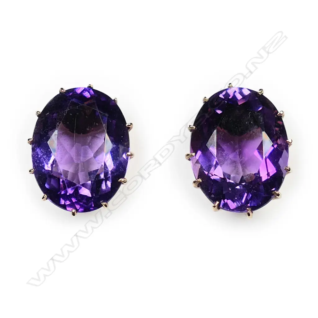 A pair of estate 9ct gold and amethyst stud earrings, Image 1++