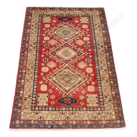 A hand-woven Shirvan carpet,