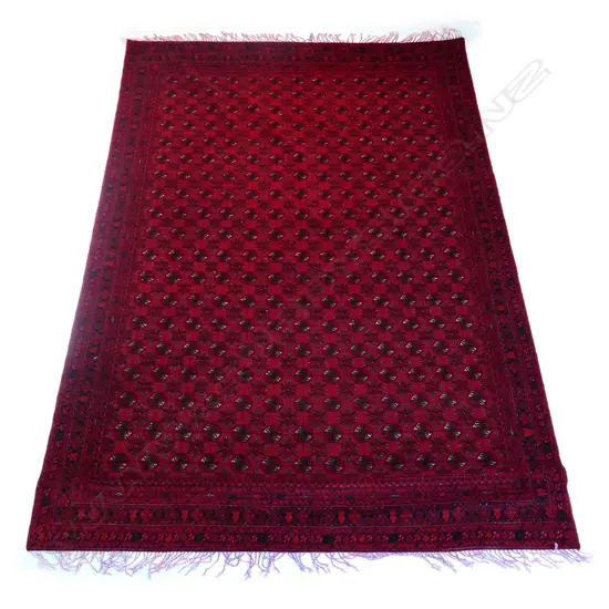 A hand knotted Turkman carpet,