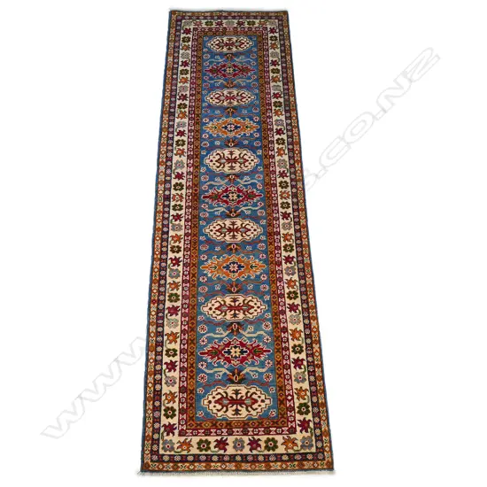A hand knotted Kazak runner,