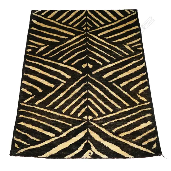 A hand-knotted Gabbeh rug,