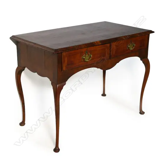A Georgian mahogany lowboy,