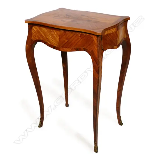 A small French king wood side table,
