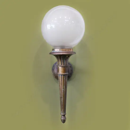 An early 20thC large bronze wall sconce,