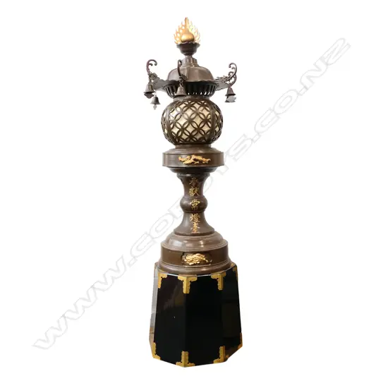 A Meiji Japanese bronze floor standing temple lantern on base,