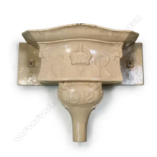 A large cast iron 1912 George V rain hopper,