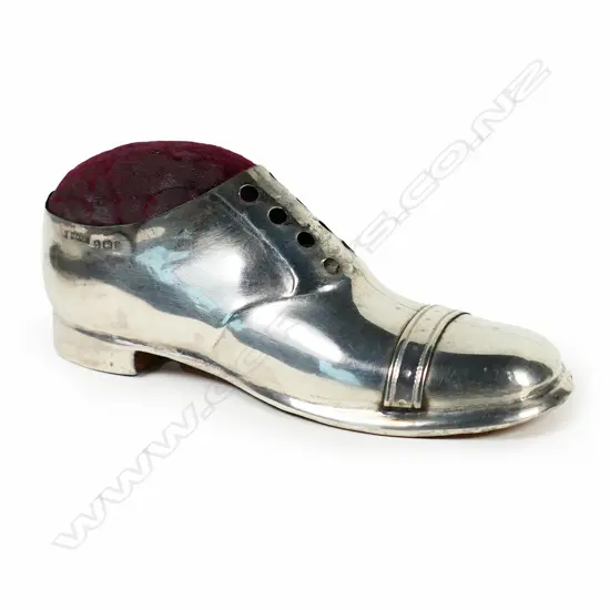 An Edwardian silver pin cushion,