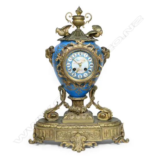A 19thC French Ormolu and Sevres-type mantel clock,