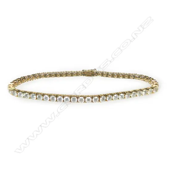 A 14ct gold and diamond tennis bracelet,