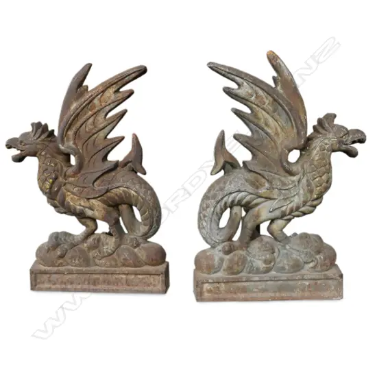 A pair of large and impressive early 19thC cast iron andirons,