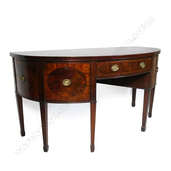 A George III mahogany Sheraton bow front sideboard,