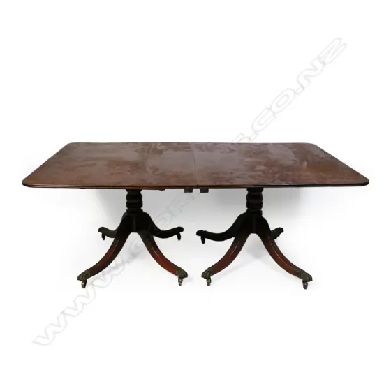 A Regency mahogany twin pedestal banquet table,