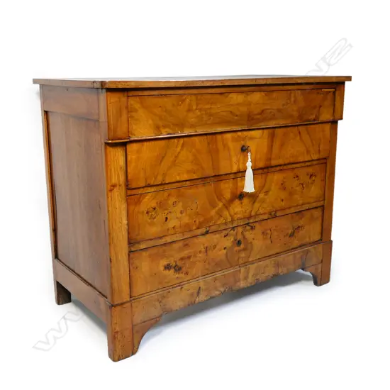 A 19thC French figured walnut four drawer chest,