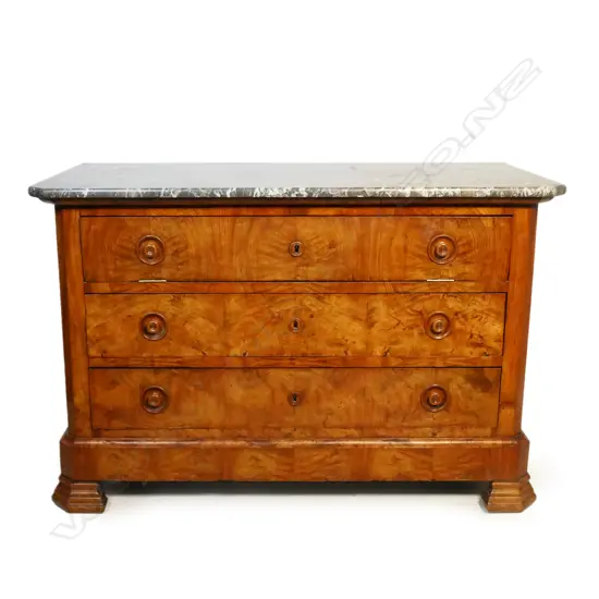An early 19thC French Louis Philippe walnut commode,