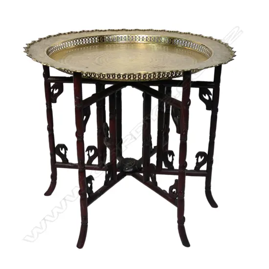 A quality Chinese hardwood and brass tray top table,