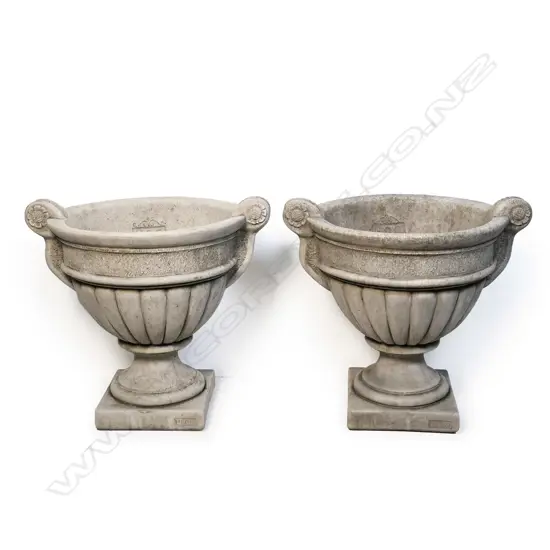 A pair of fine concrete garden 'Alton' urns,