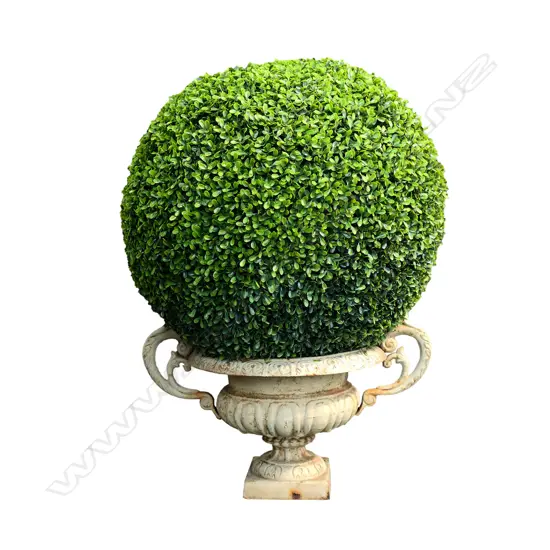 A small cast iron garden urn,