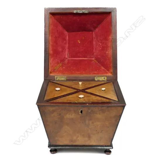 A Regency walnut tea caddy,