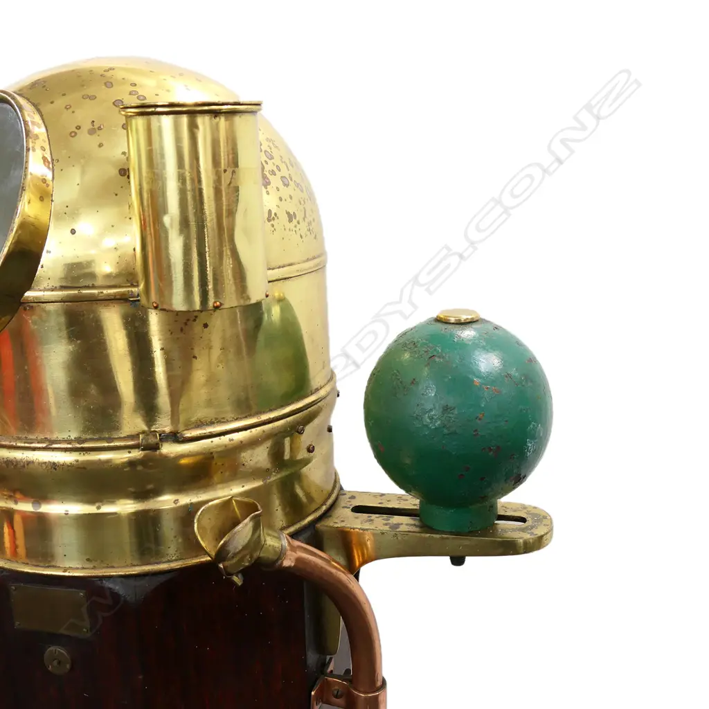 A ship's binnacle compass, octagonal teak case on square plinth base, with brass glazed dome and fittings, flanked by red and green painted steel balls, the Hartmann, Hamburg compass with Lilley & Reynolds, London card. H.1500mm. Image 1++