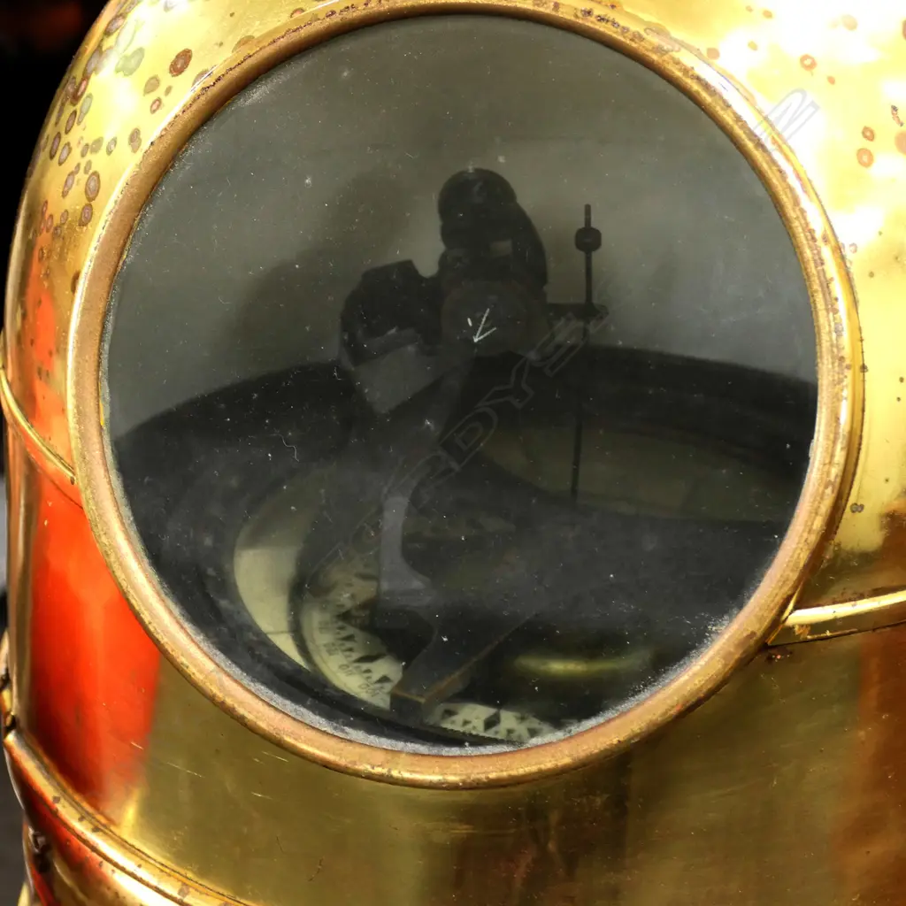 A ship's binnacle compass, octagonal teak case on square plinth base, with brass glazed dome and fittings, flanked by red and green painted steel balls, the Hartmann, Hamburg compass with Lilley & Reynolds, London card. H.1500mm. Image 1++