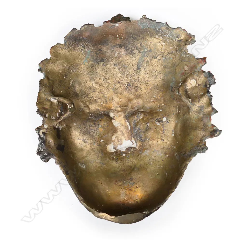 A contemporary bronze sculpture of a male Māori face, Image 1++