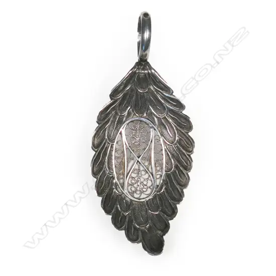 A rare George III silver Eagle’s Wing type tea leaf strainer spoon,