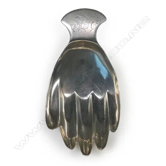A rare George III silver hand caddy spoon,