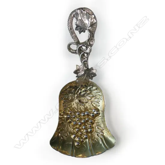 Early 19thc fancy cast silver caddy spoon,