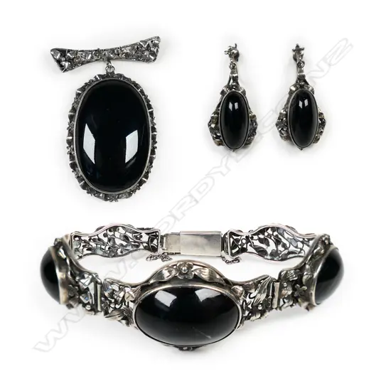 A vintage silver and onyx parure,