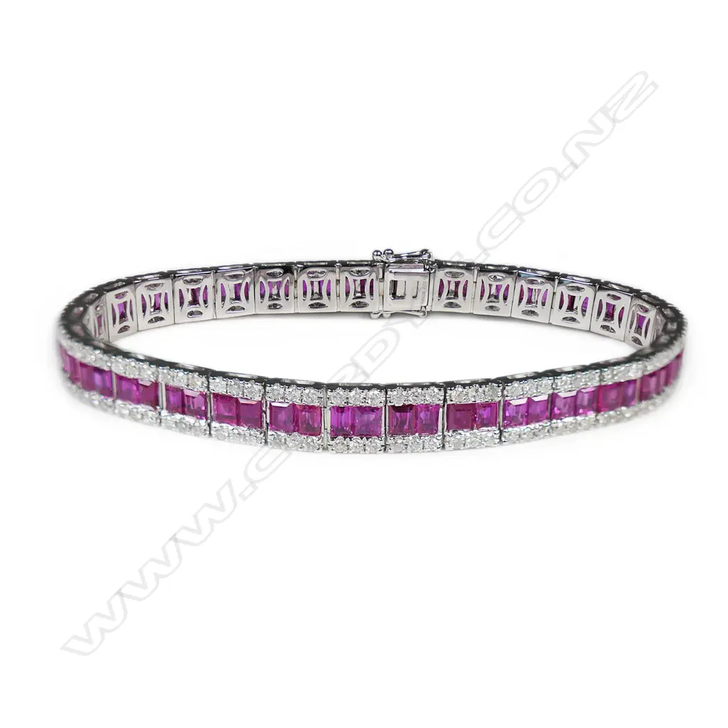 An 18ct white gold diamond and ruby tennis bracelet, Image 1++