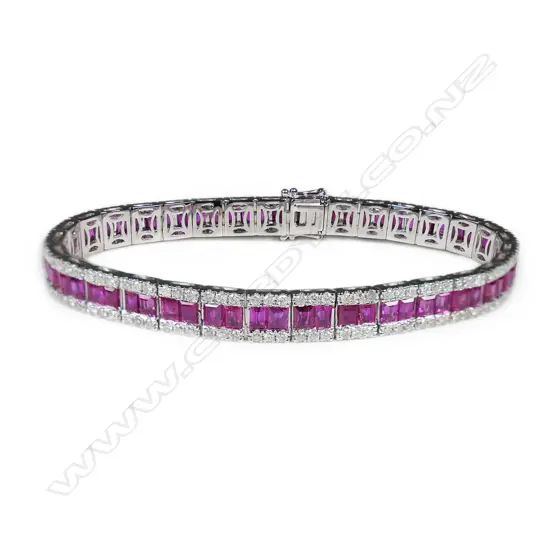 An 18ct white gold diamond and ruby tennis bracelet,
