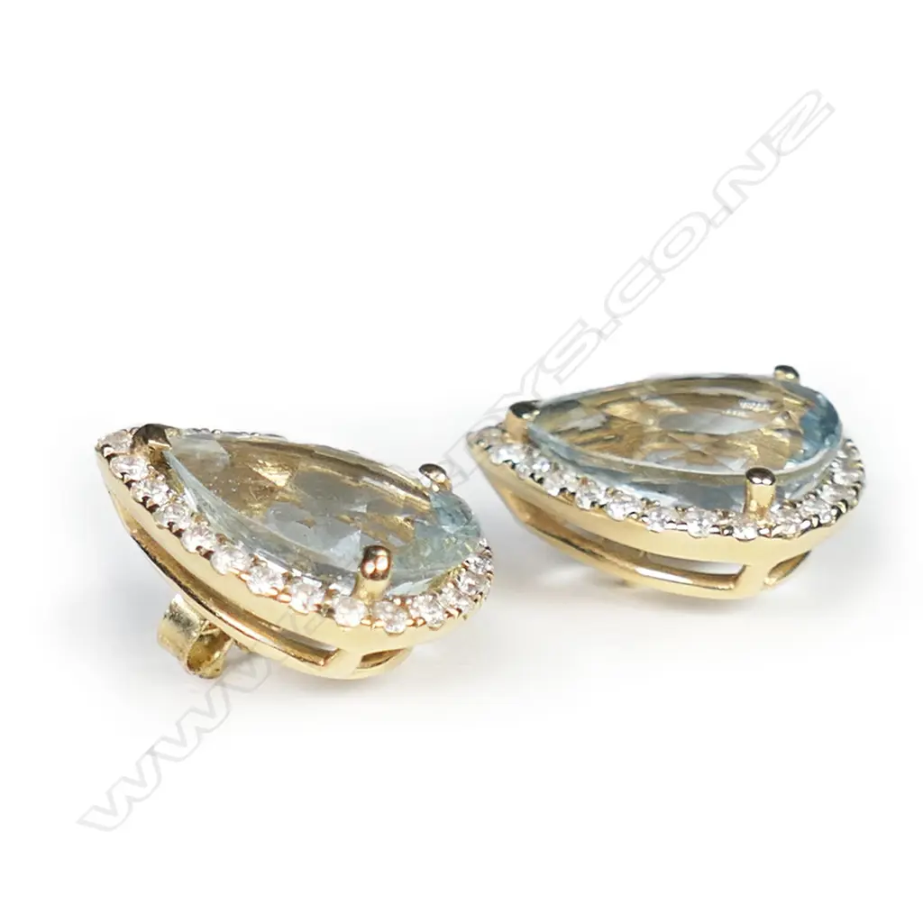 A pair of 14ct yellow gold aquamarine and diamond halo stud earrings, Image 1++