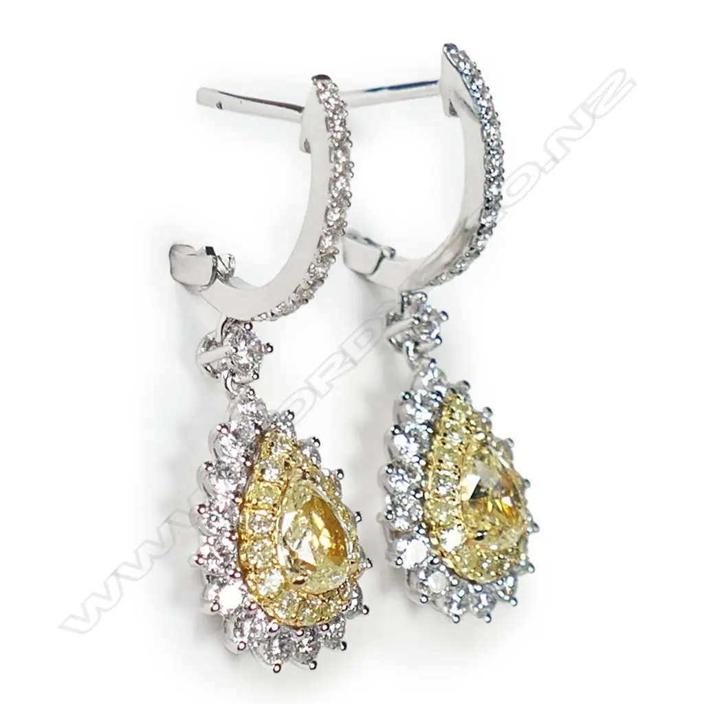 A pair of 18ct yellow and white gold diamond earrings, Image 1++