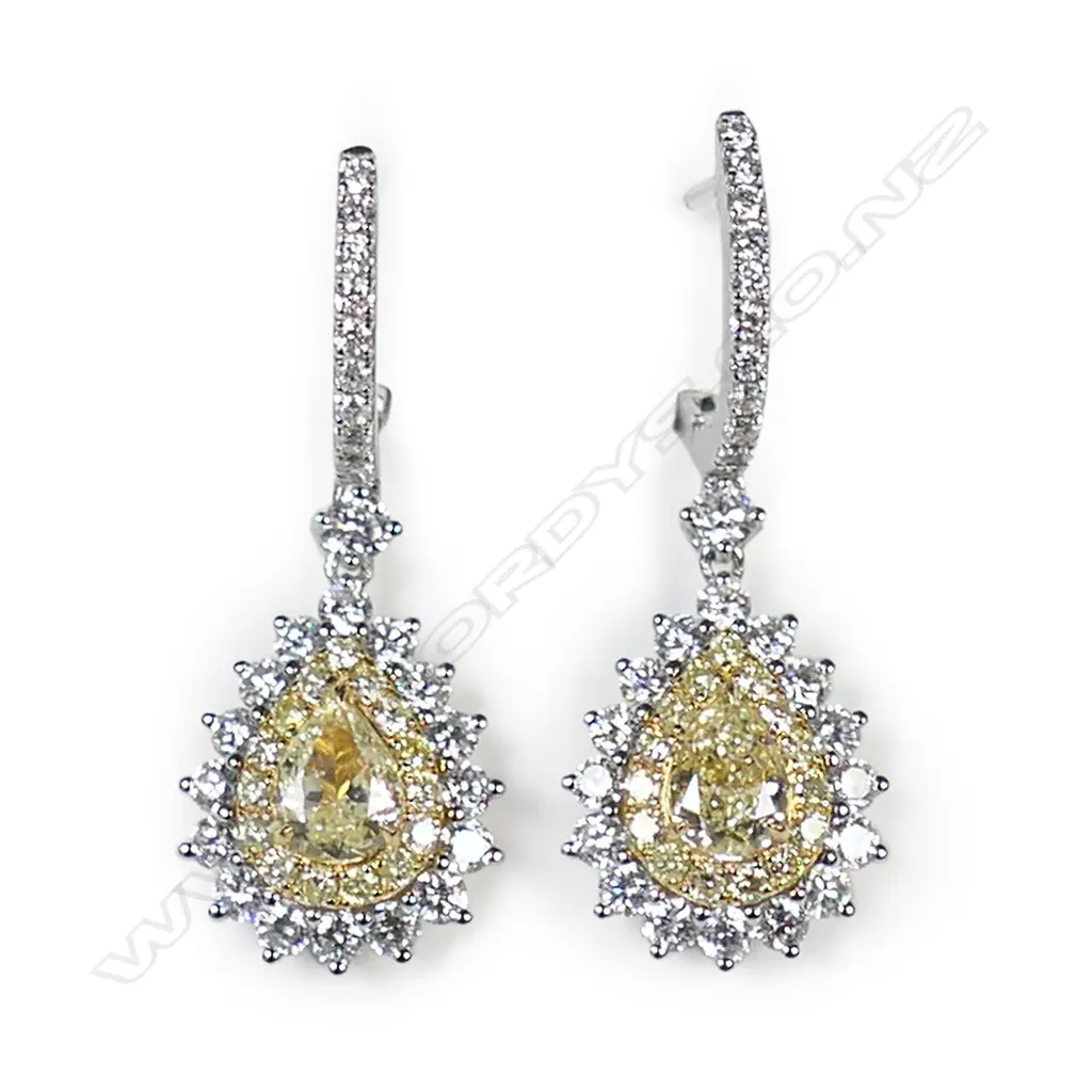 A pair of 18ct yellow and white gold diamond earrings, Image 1++