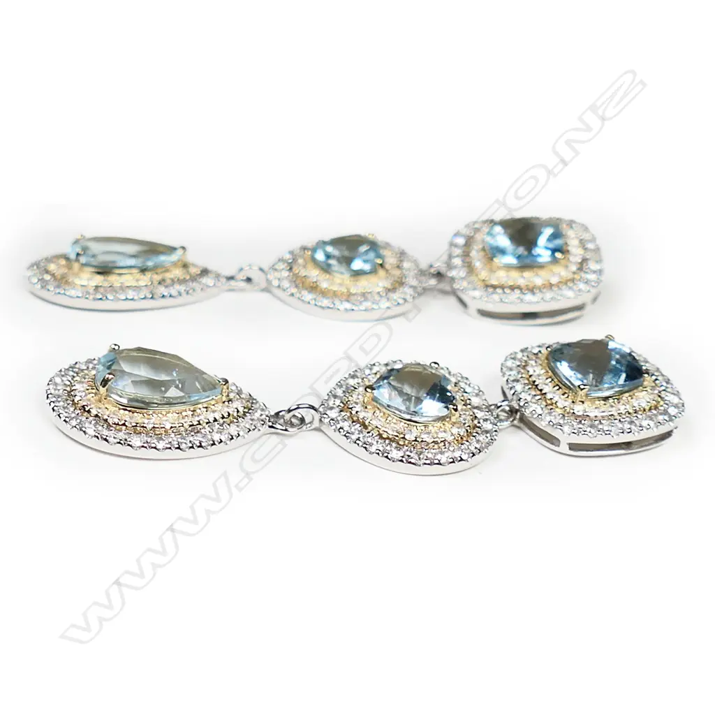 A pair of 14ct white and yellow gold aquamarine and diamond halo triple drop earrings, Image 1++