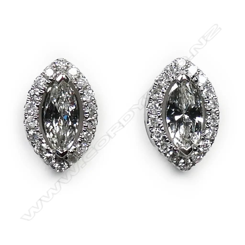 A pair of 14ct white gold and diamond halo stud earrings, Image 1++