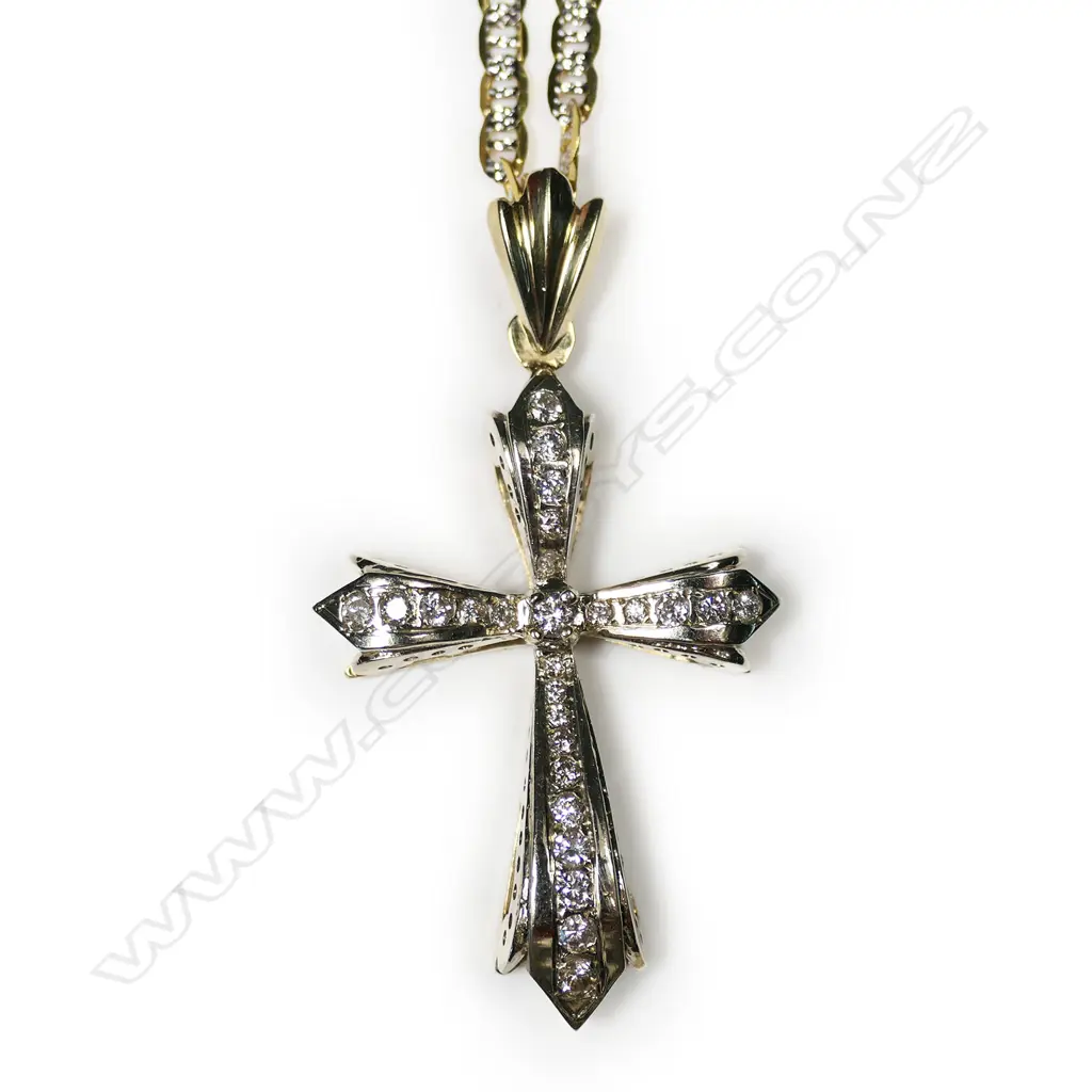 A 14ct gold and diamond cross pendant, Image 1++