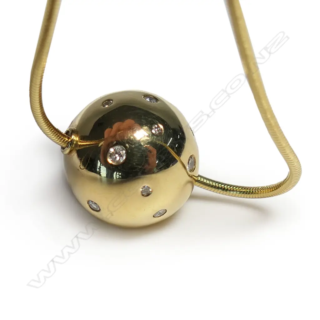 An 18ct yellow gold handmade diamond set ball on chain, Image 1++