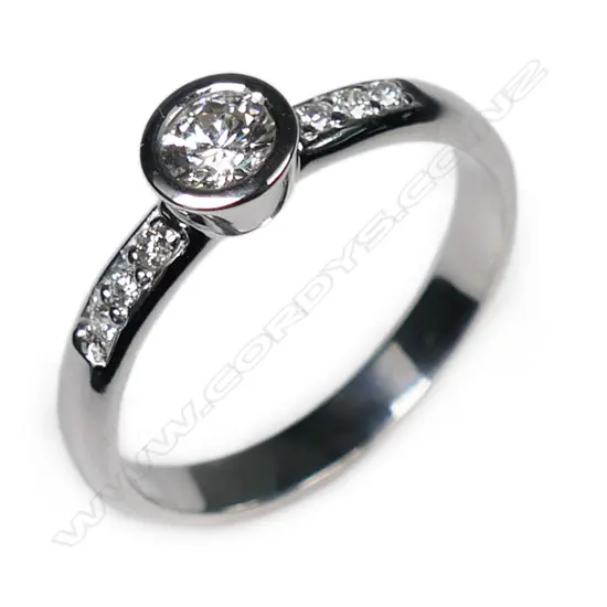 An 18ct white gold and diamond solitaire ring,