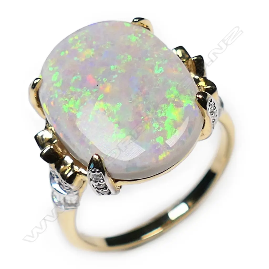 A 14ct gold white opal and diamond cocktail ring, Image 1++