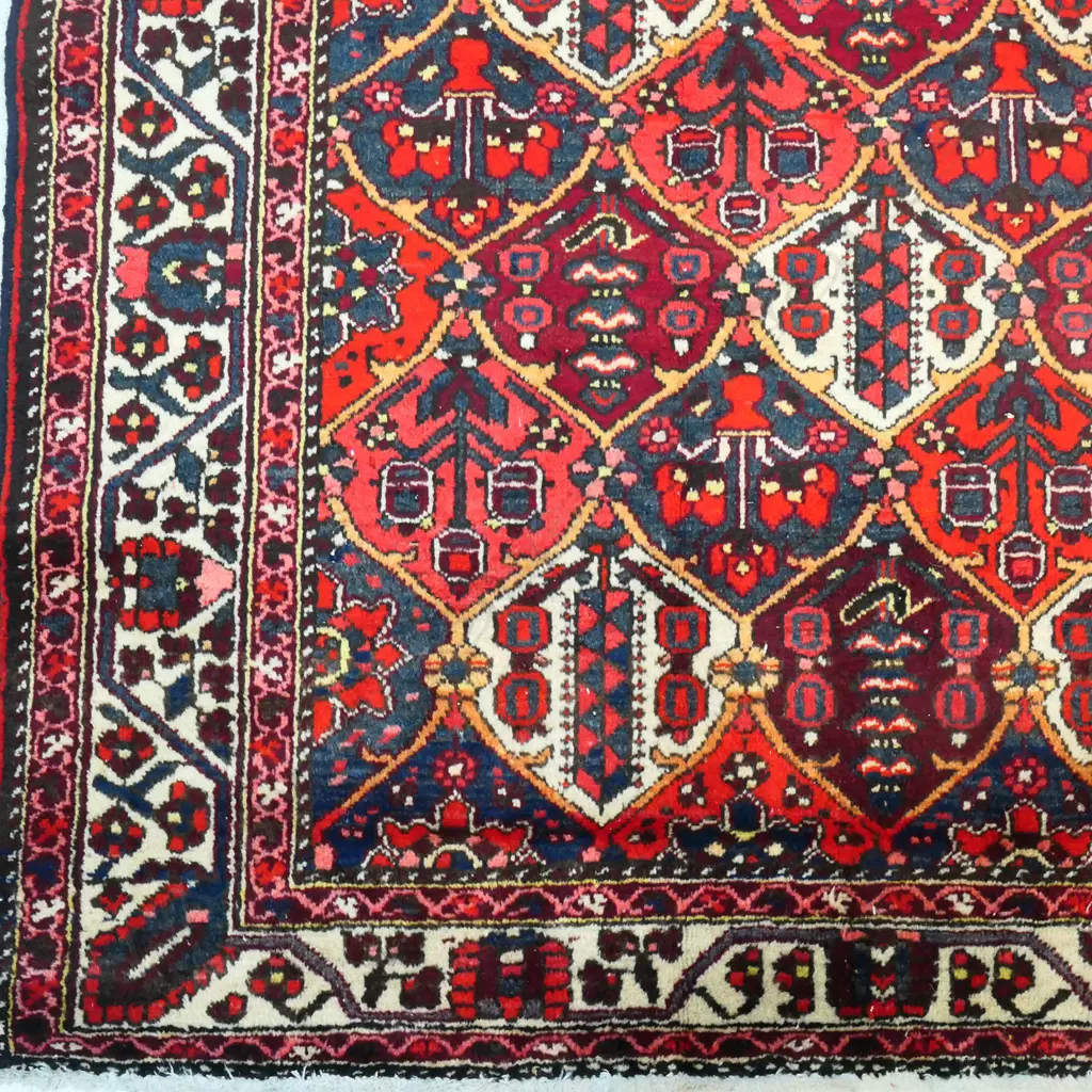 A hand-knotted wool pile Bakhtiar rug, Image 1++