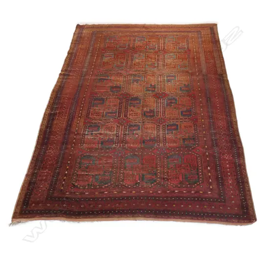 An antique Afghan carpet,