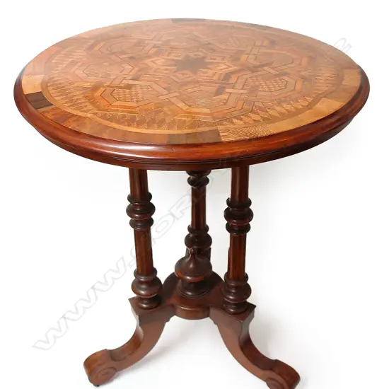 An Anton Seuffert elaborately inlaid parquetry card table top,