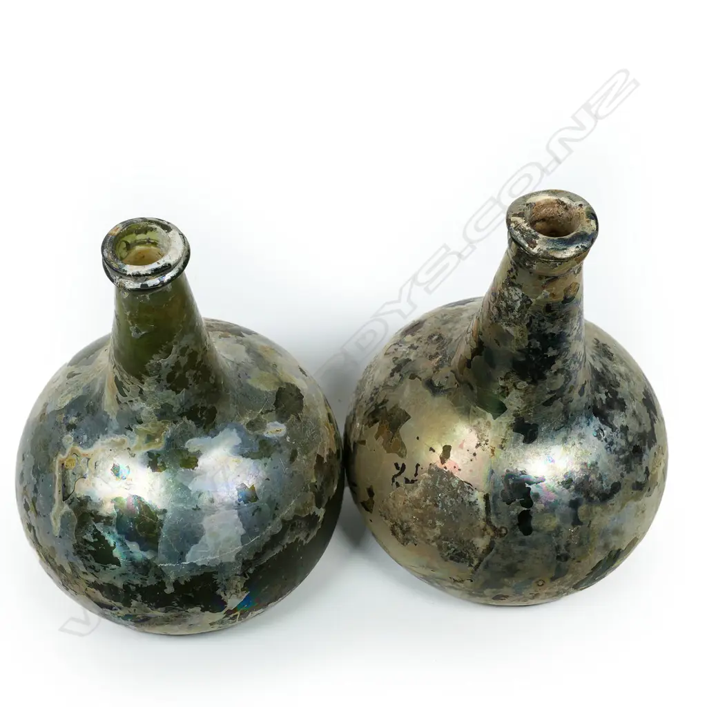 A pair of Dutch or English 17thC onion wine bottles, with rich iridescent patina, Image 1++