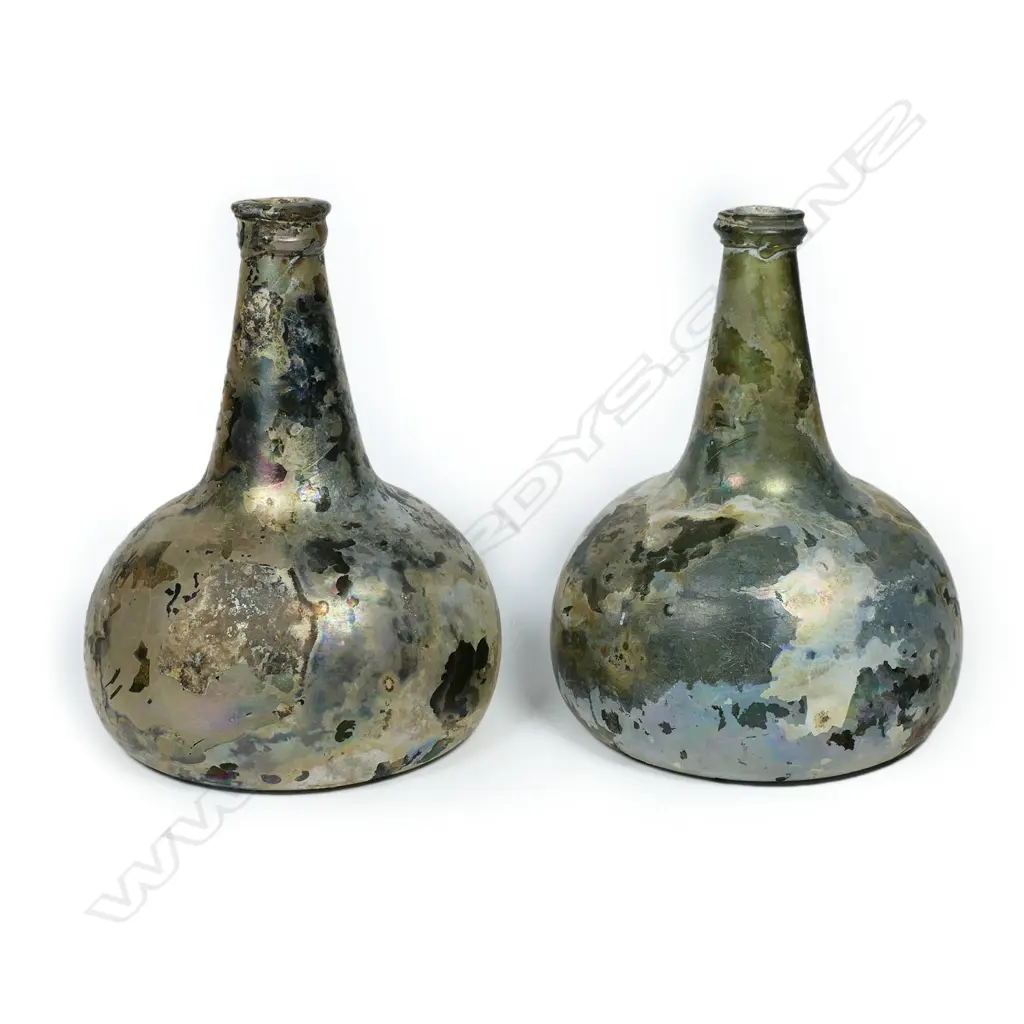 A pair of Dutch or English 17thC onion wine bottles, with rich iridescent patina, Image 1++